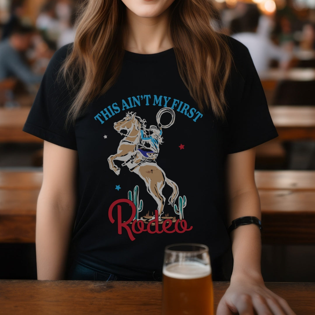 This Ain't My First Rodeo Western Graphic T-shirt | Women's Country Graphic Tees | Cowgirl T-shirts