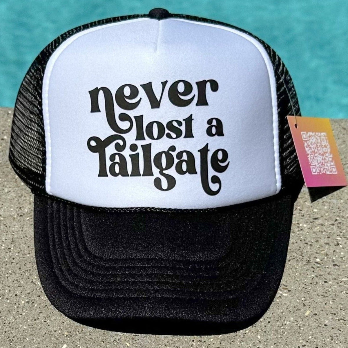Never Lost A Tailgate | Football | Black & White Trucker Hat by Haute Sheet Hats TheFringeCultureCollective