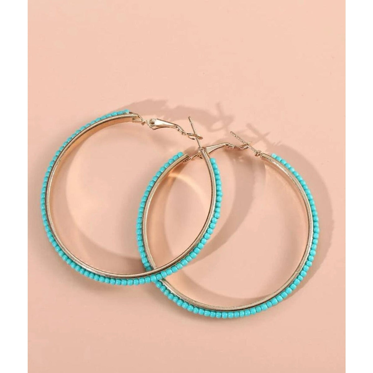 Turquoise beaded hoops TheFringeCultureCollective